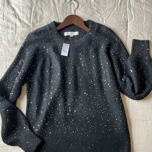Black sweater with small, shiny metallic specks